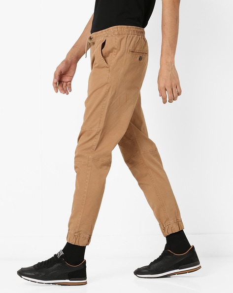 Buy Khaki Trousers & Pants for Men by AJIO Online