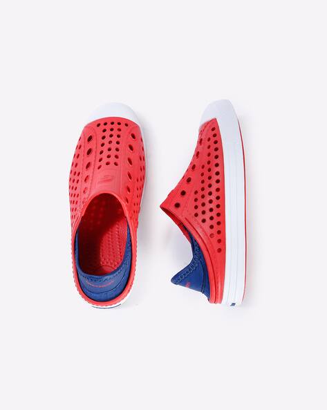 red slip on skechers