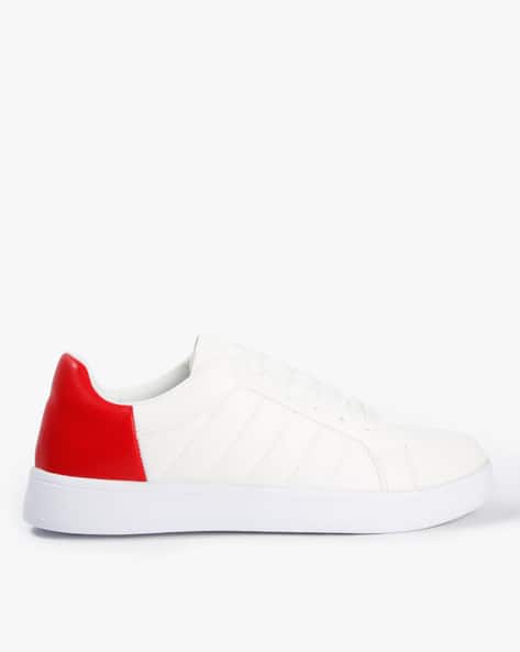white and red sneakers
