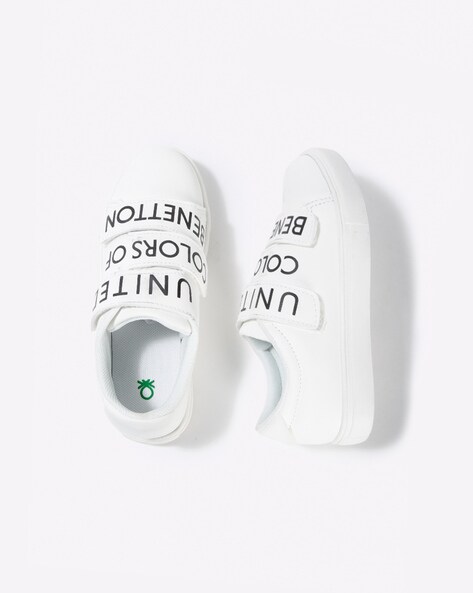 white sneakers with velcro straps