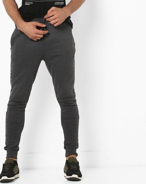 Buy Flying Machine Men Grey Mid Rise Solid Track Pants - NNNOW.com