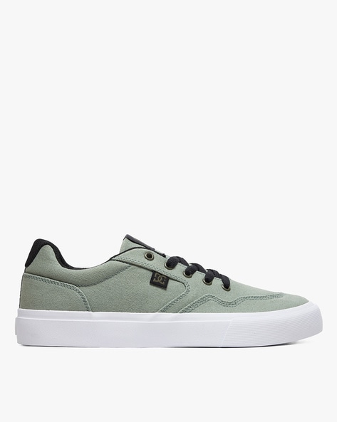 Buy Green Sneakers for Men by DC Shoes 