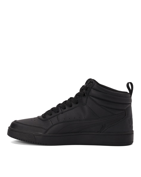 Puma black high store ankle sneakers