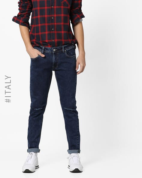 Lightly Washed Jeans with Ripped Knee