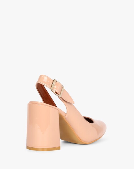 Buy Orange Eleanor Lasercut Block Heels by THE ALTER Online at Aza Fashions.