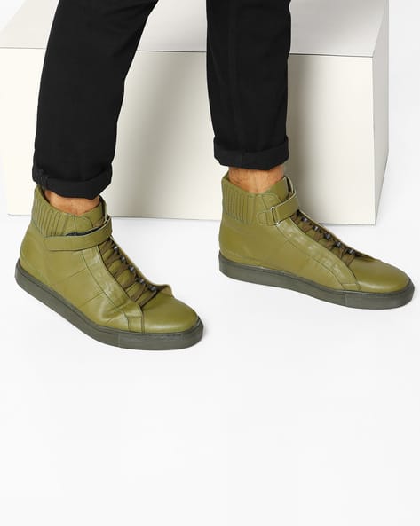 olive green high top sneakers