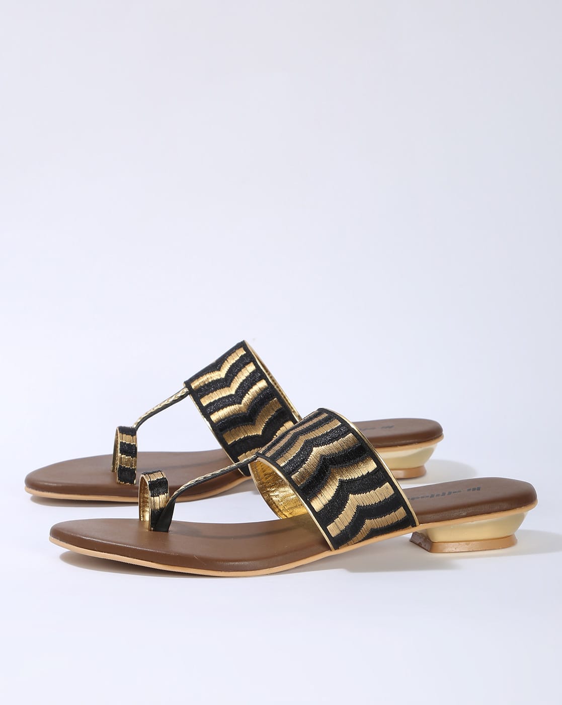 black and gold flat sandals