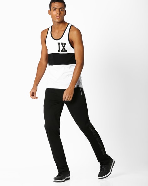 Buy White Black Vests for Men by Garcon Online Ajio