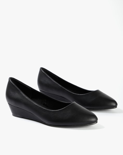 black wedge heel pumps