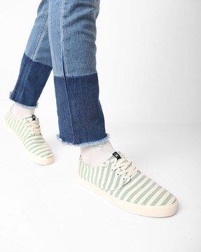 Ucb white textured discount sneakers