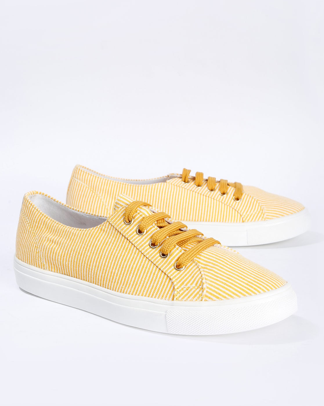 yellow canvas shoes