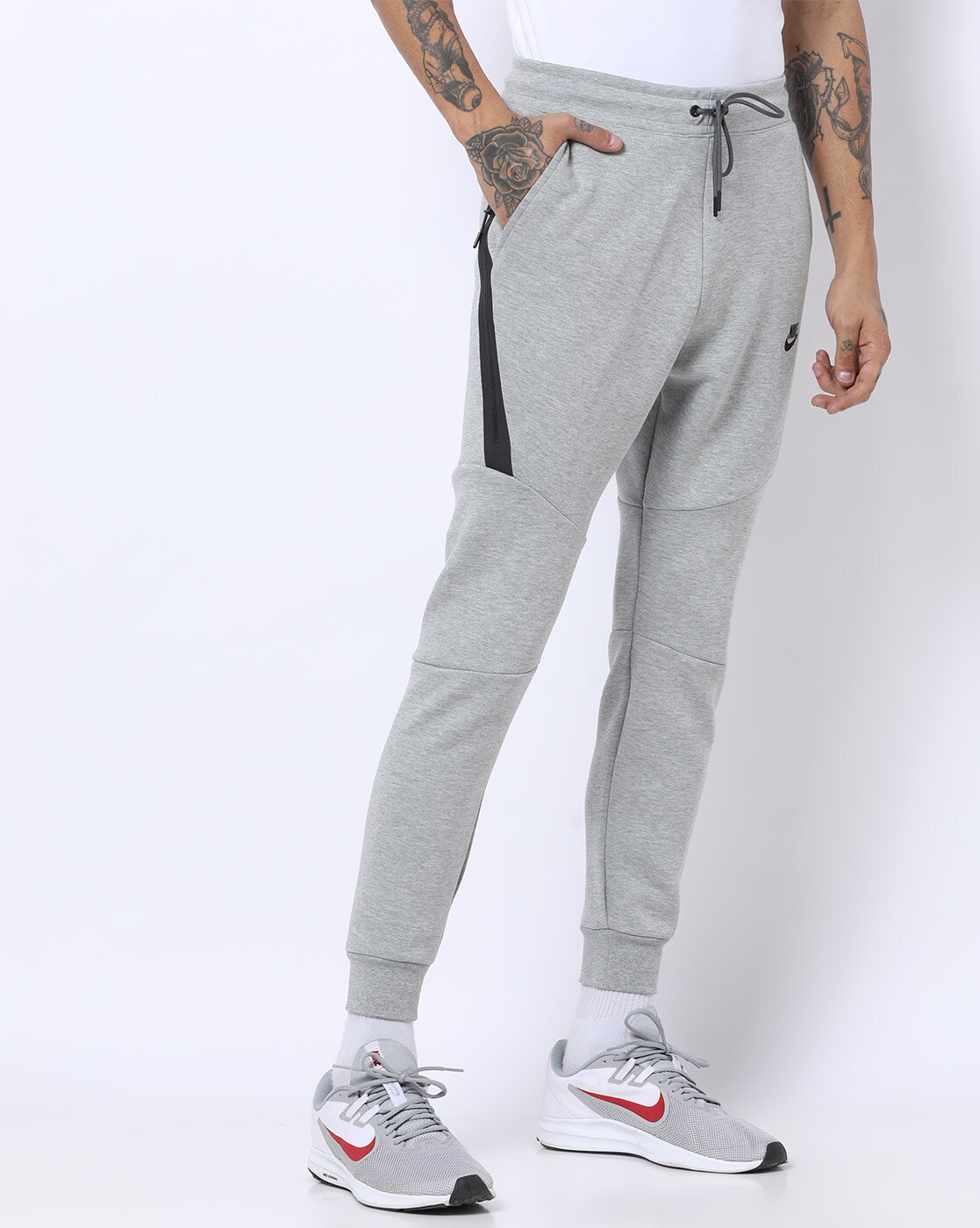 grey nike joggers with side pockets