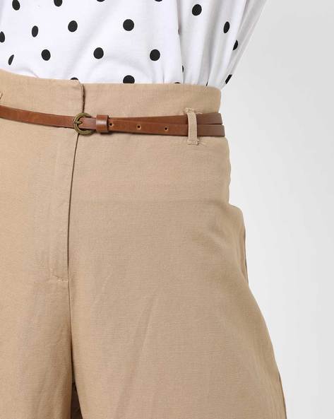 beige trousers with belt