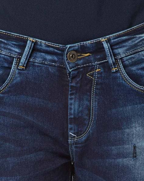Skinny Fit Distressed Mid-Rise Jeans (Image - 1)