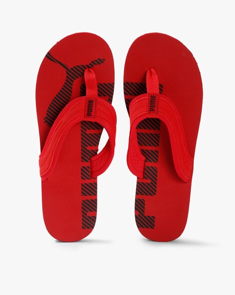red puma flip flops