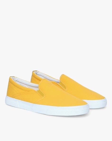 Mens yellow slip store on shoes