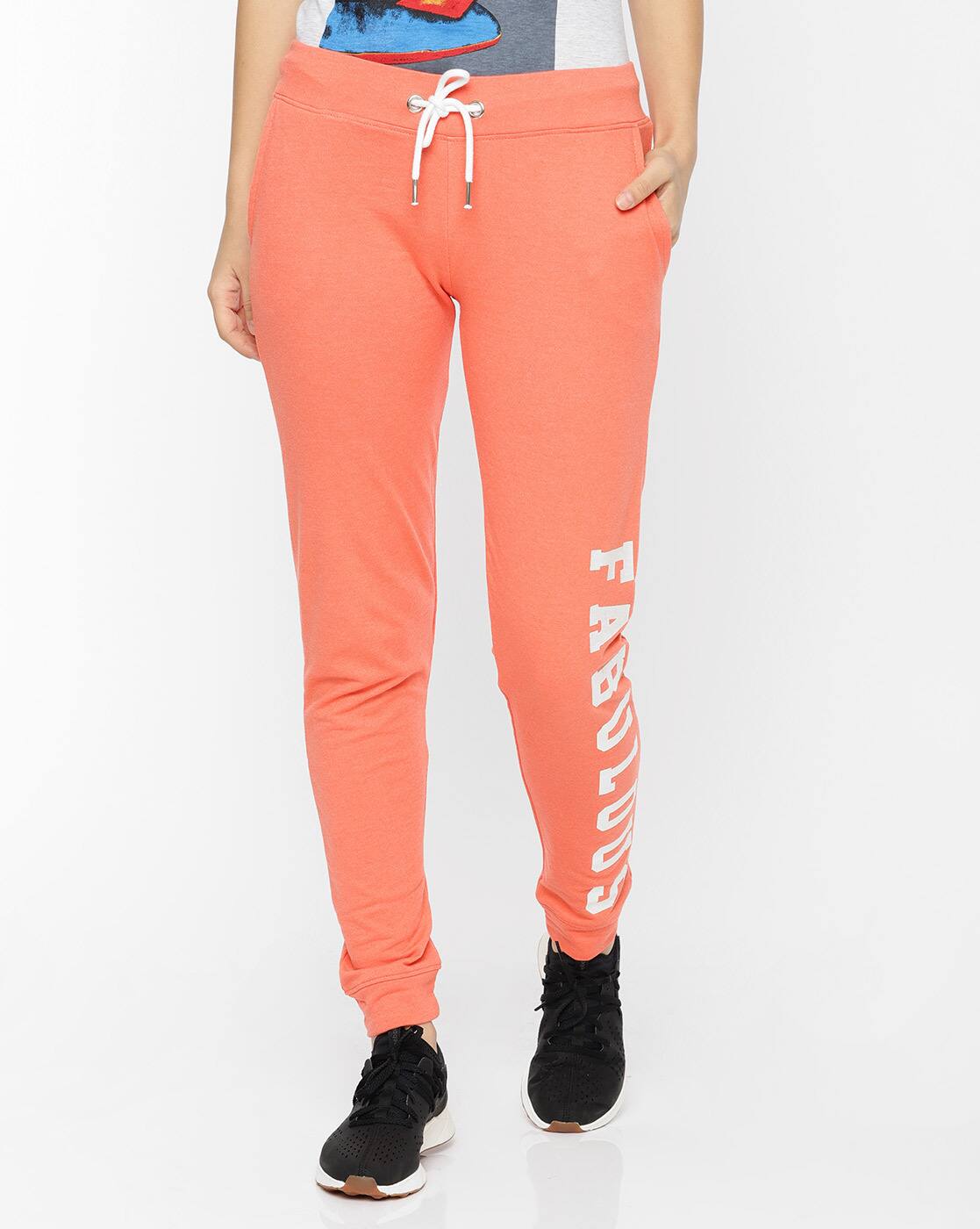 orange track pants