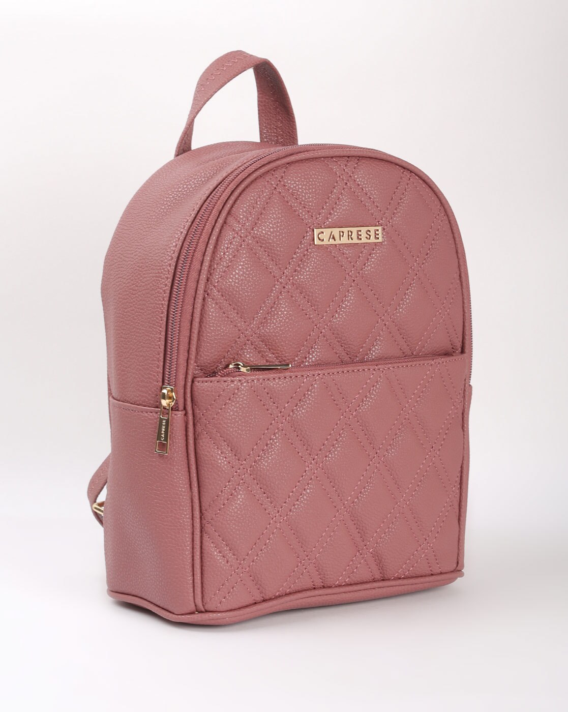 pink quilted backpack