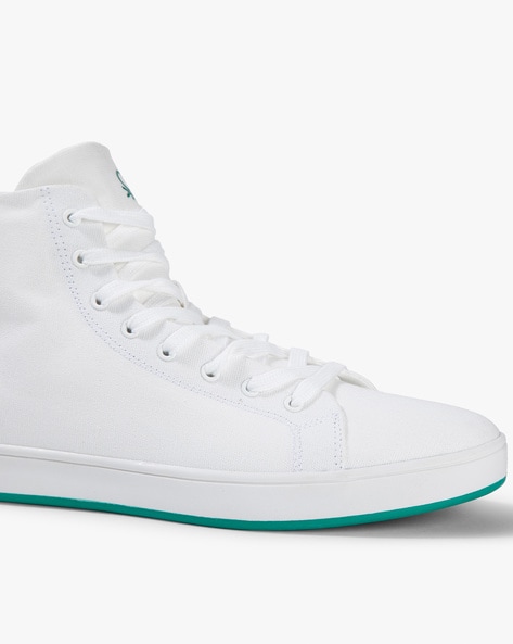 Ucb white store casual shoes