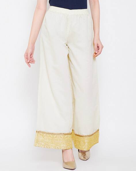 off white palazzo pants online