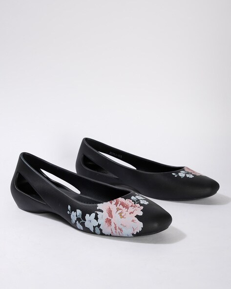 black crocs with flowers