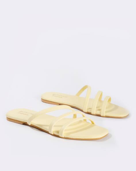 yellow strappy flat sandals