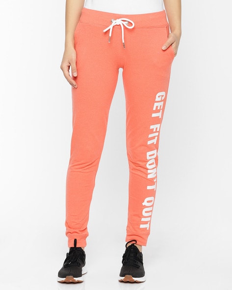 orange track pants womens