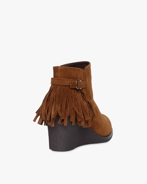 Fringe wedge clearance boots