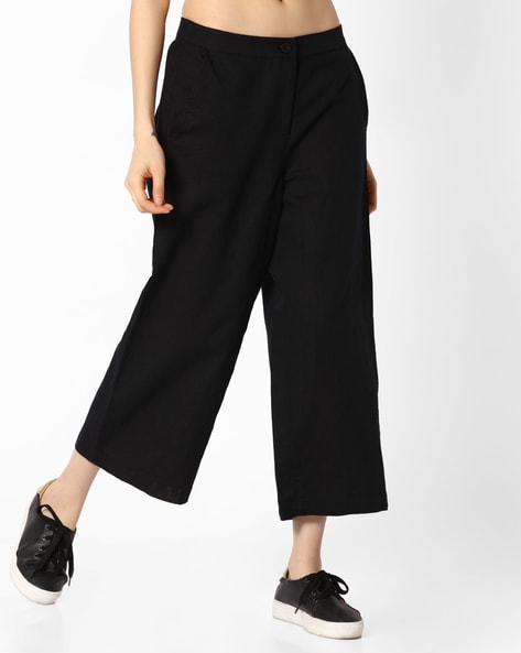 Buy Black Velvet Pleated Culotte Trousers from Next Austria