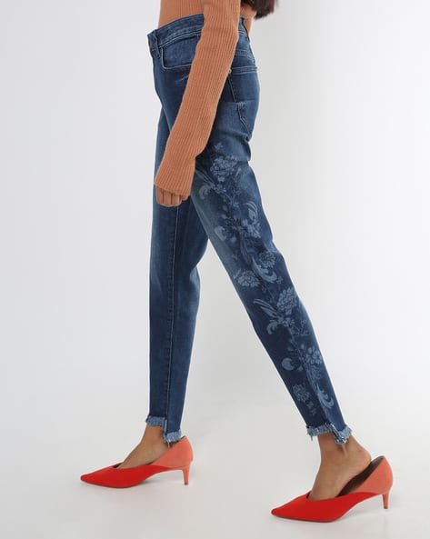 Washed Skinny Jeans with Floral Motifs (Image - 1)
