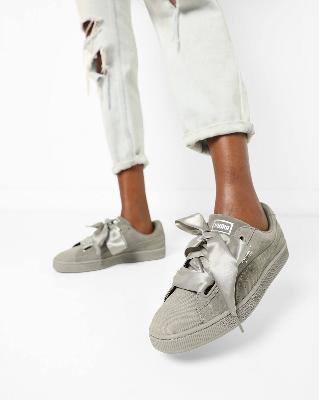 puma with ribbon ties