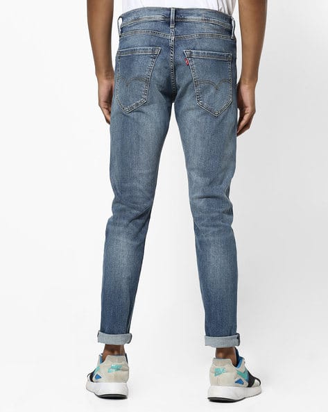 512 Mid-Wash Performance Slim Tapered Jeans (Image - 3)