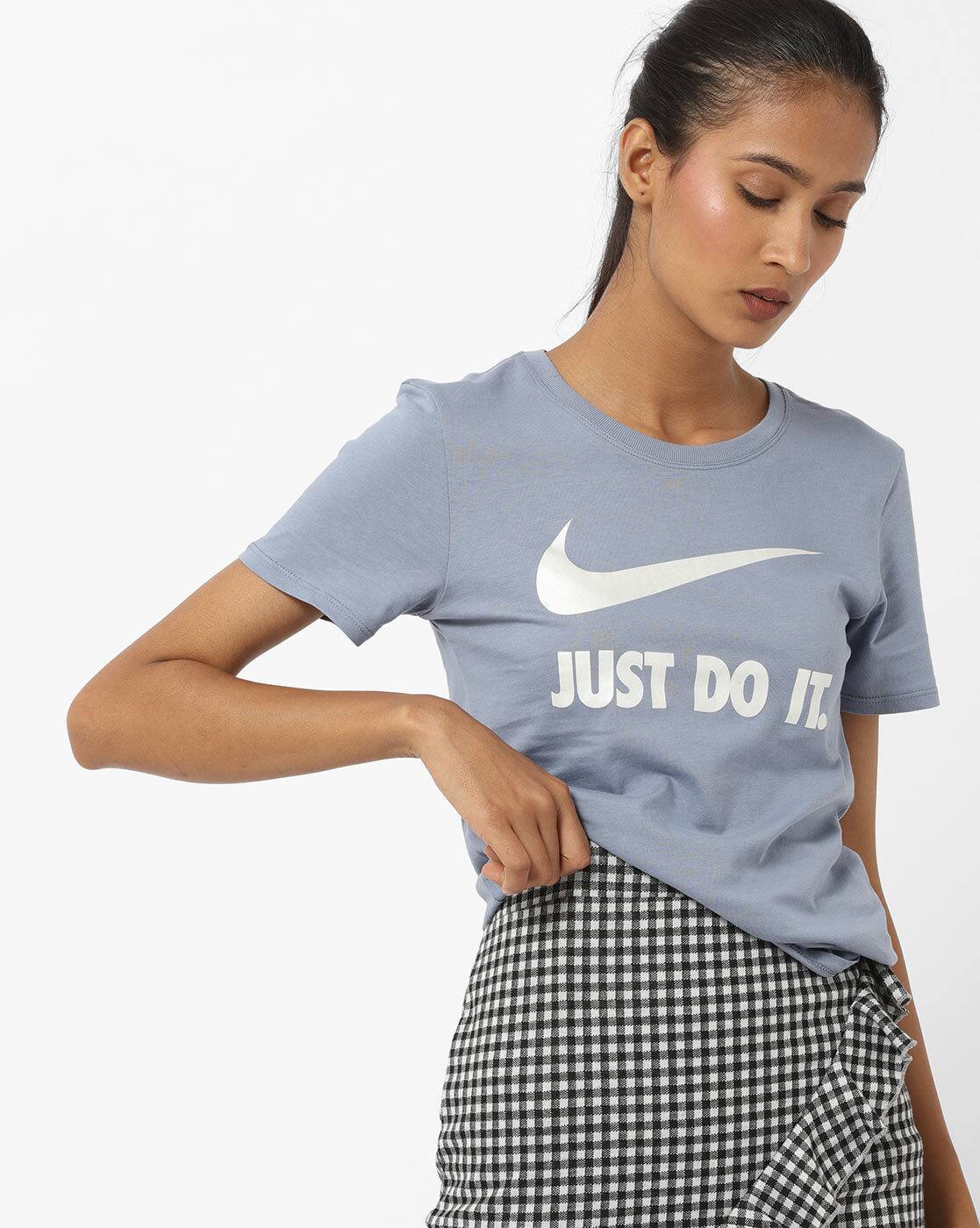 light blue and pink nike shirt