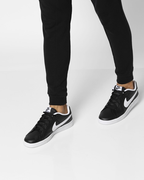 Buy Black Sneakers for Men by NIKE 