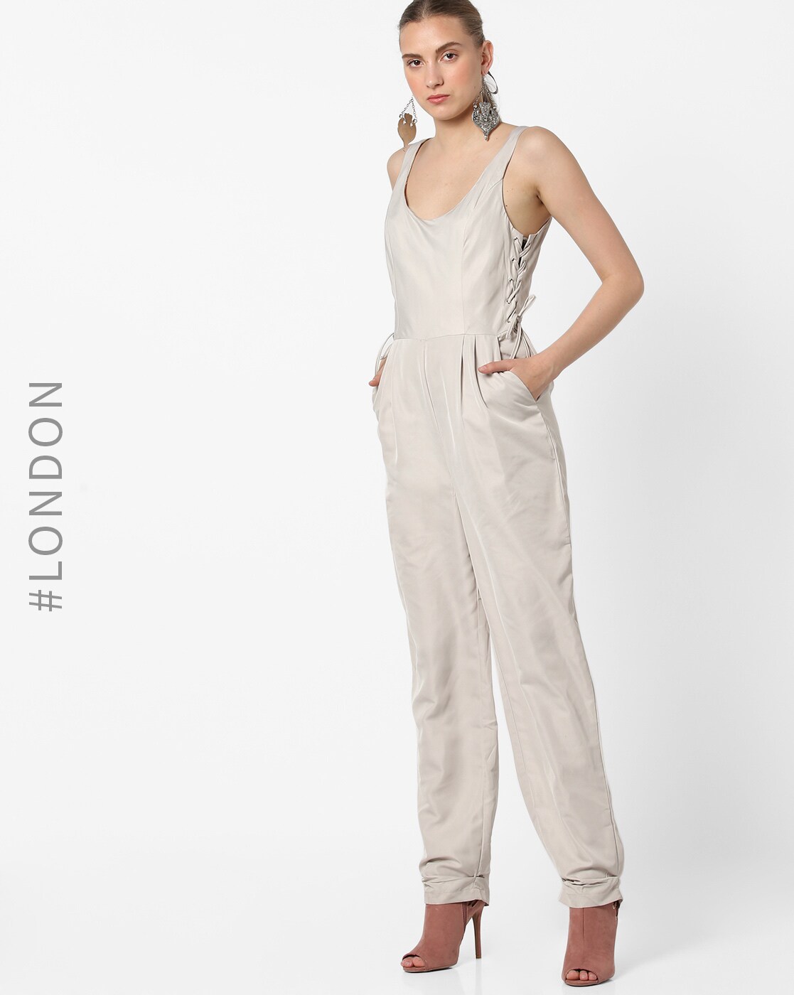 beige cross jumpsuit