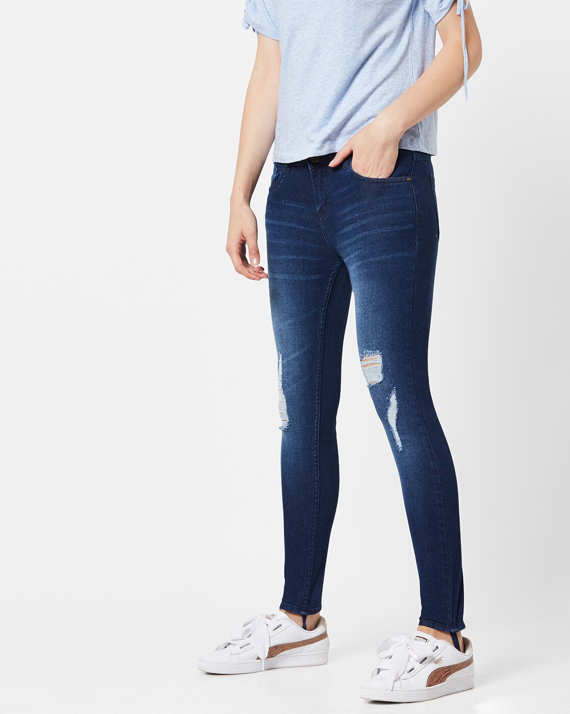 distressed mid rise skinny jeans