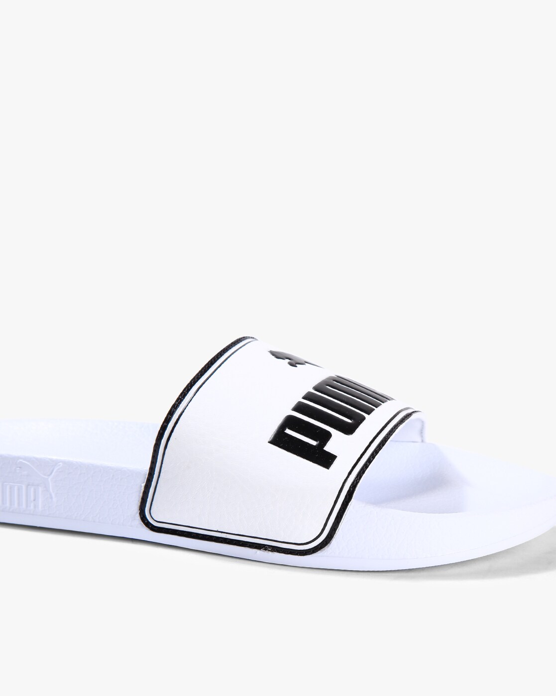 clear and white puma slides