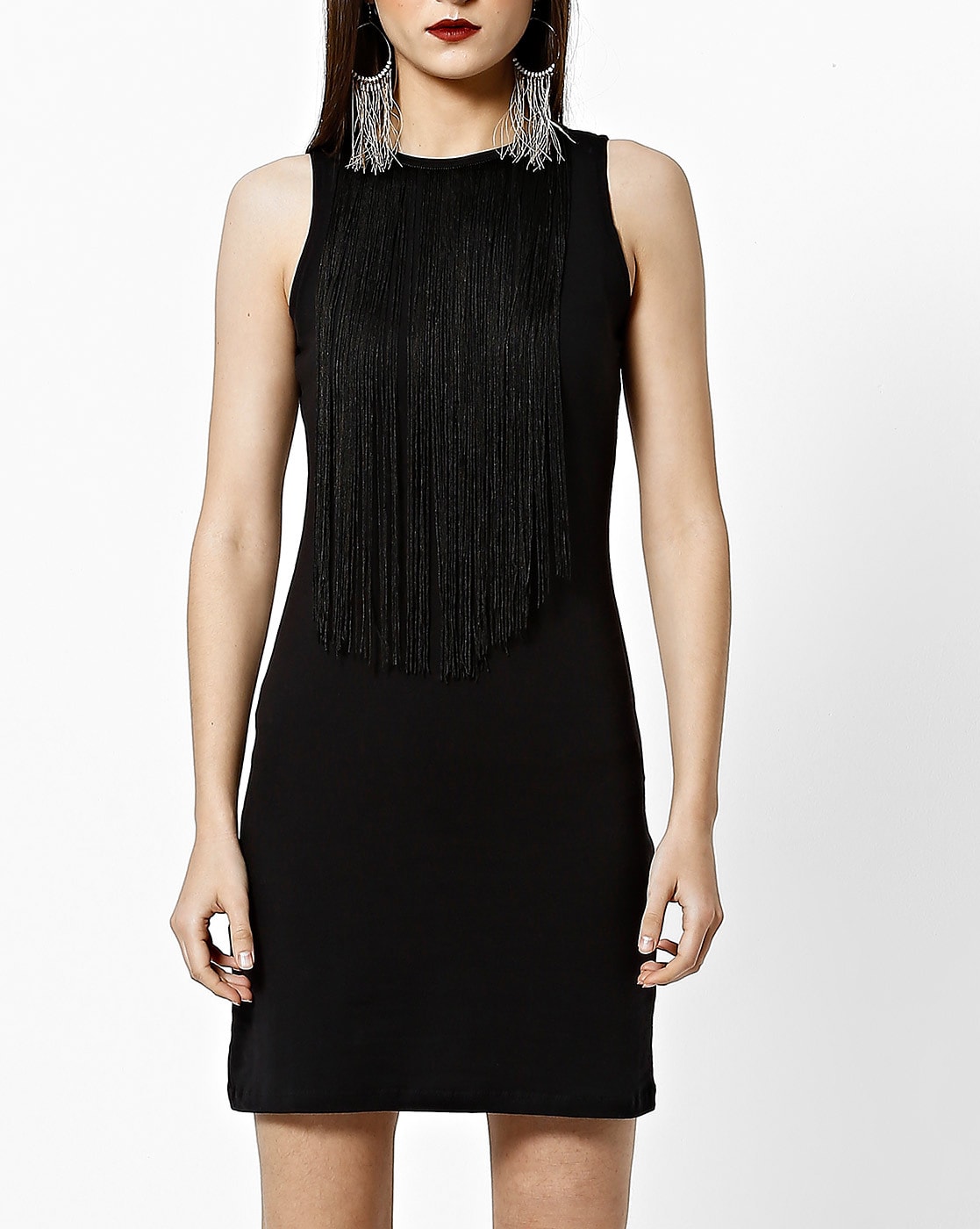 black dress with silver tassels