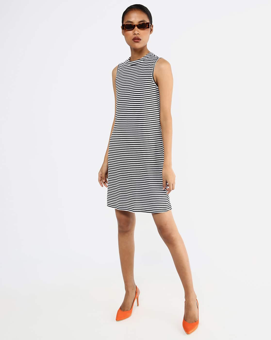 black sleeveless shift dress