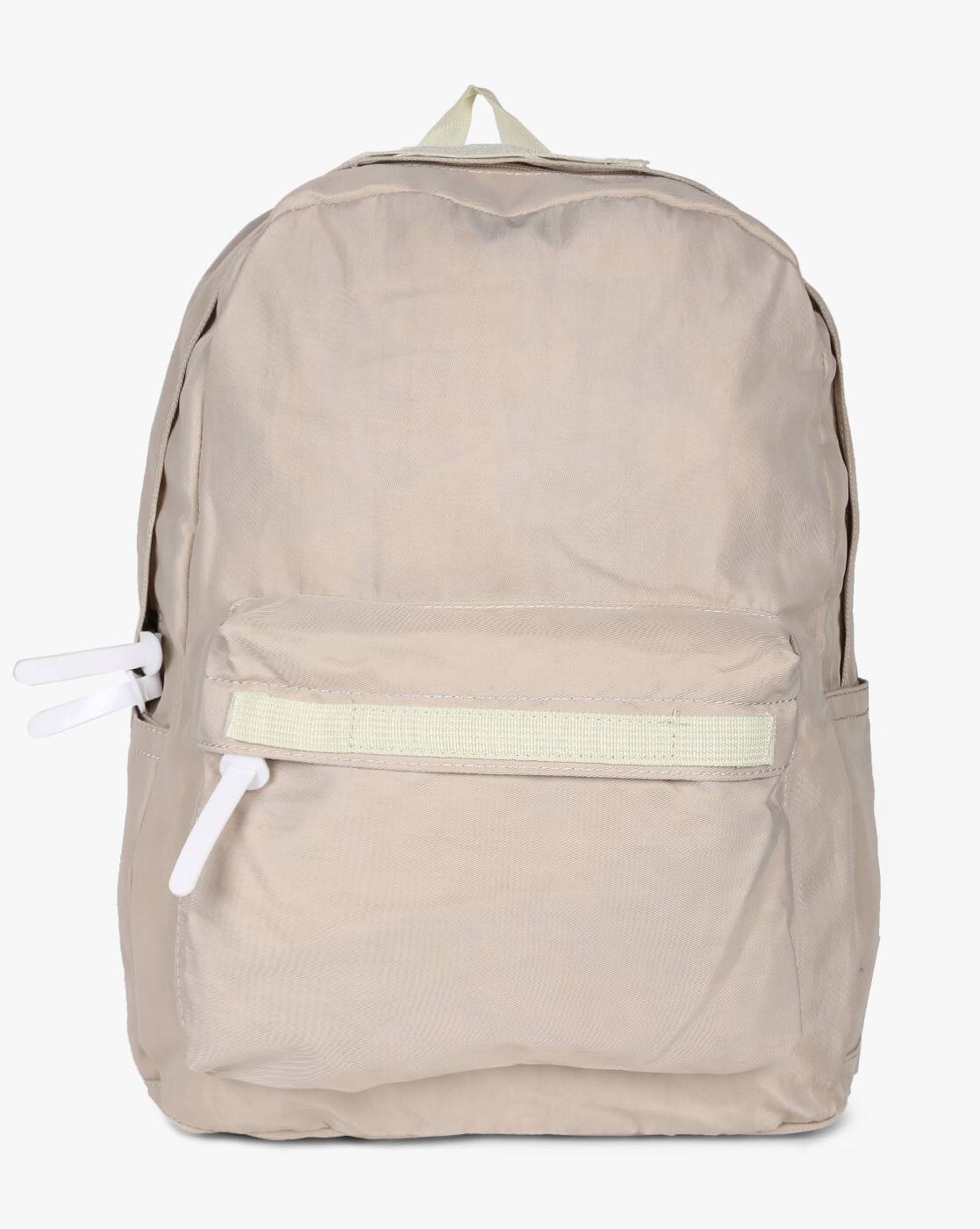 beige laptop backpack