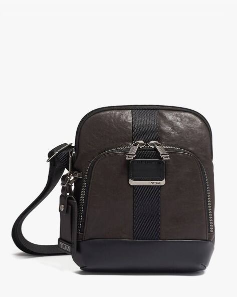 tumi lyons crossbody