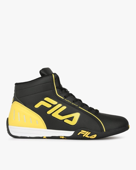 fila black and yellow sneakers 