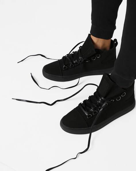 black mid top shoes
