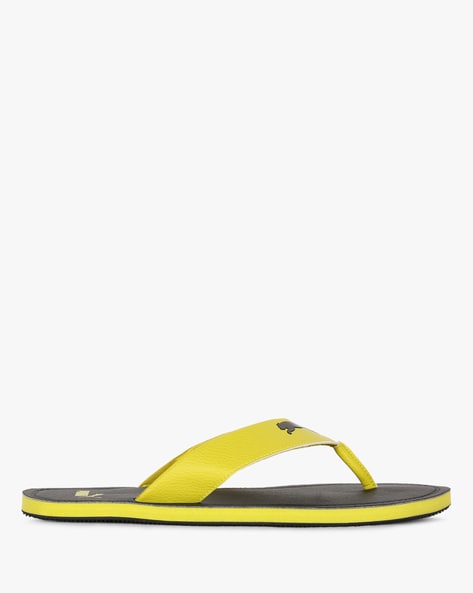 puma yellow slippers