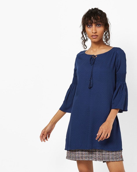 Geometric Pattern Tunic with Smocked Trumpet Sleeves