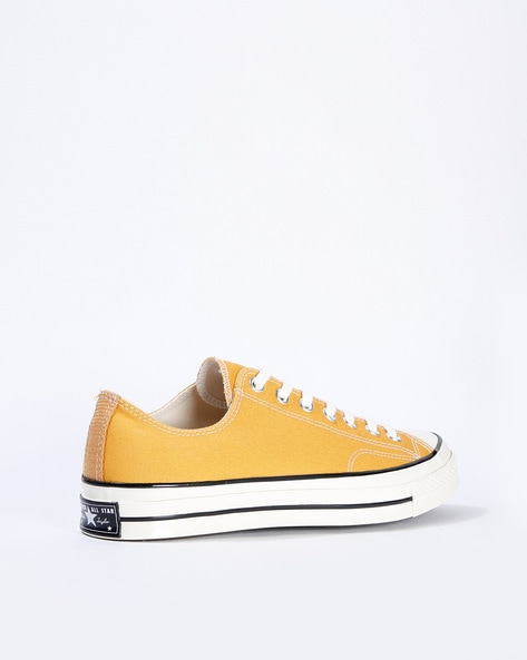 Vintage on sale yellow converse