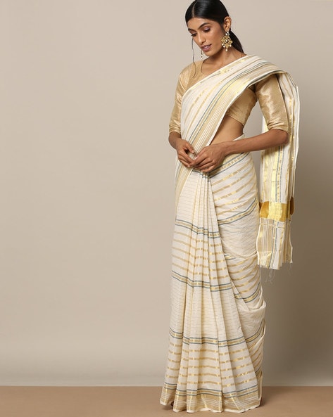 Cream plain design Kerala saree, zari border & pallu features intricate  zari designs