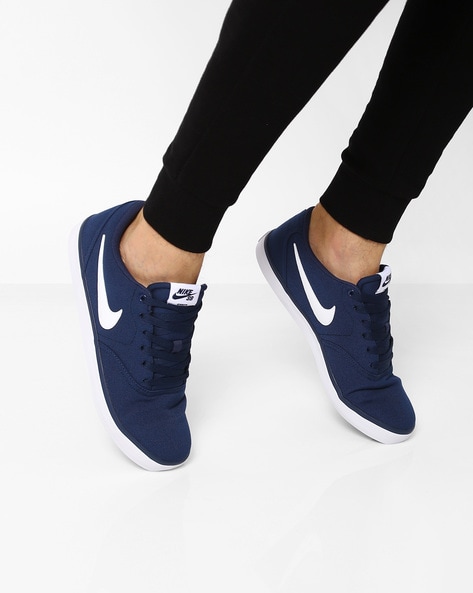 nike navy and white shoes