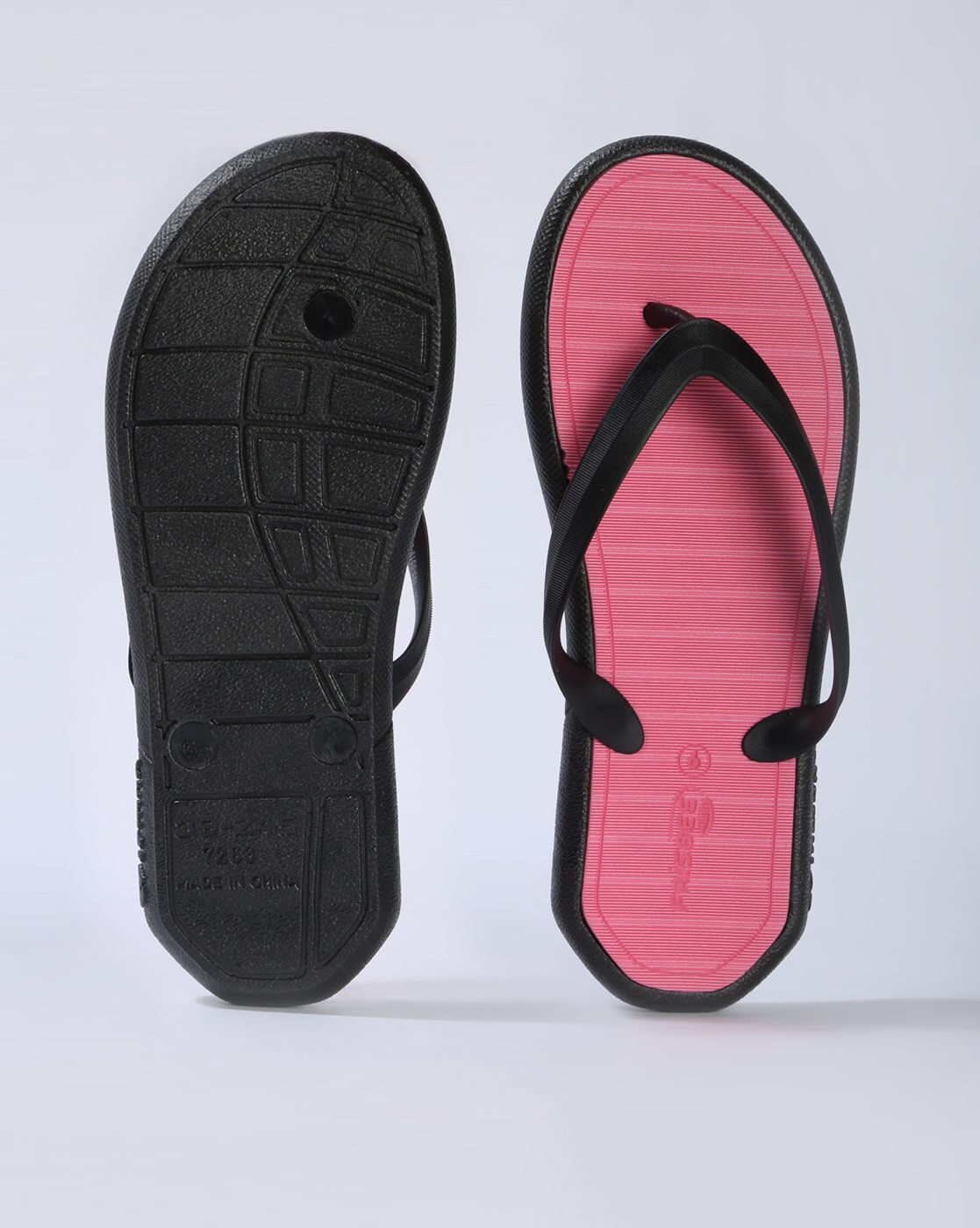 pink and black flip flops