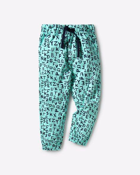 turquoise track pants
